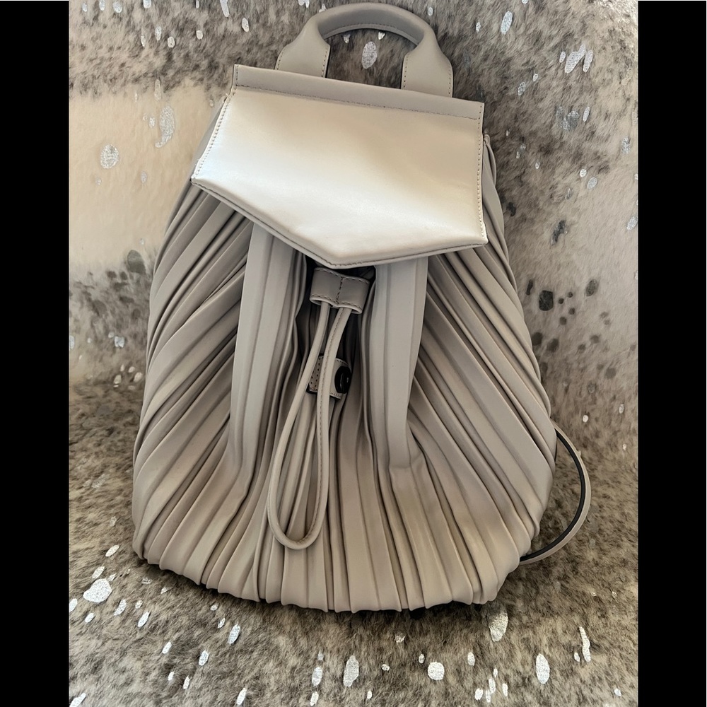 Zara light grey backpack.